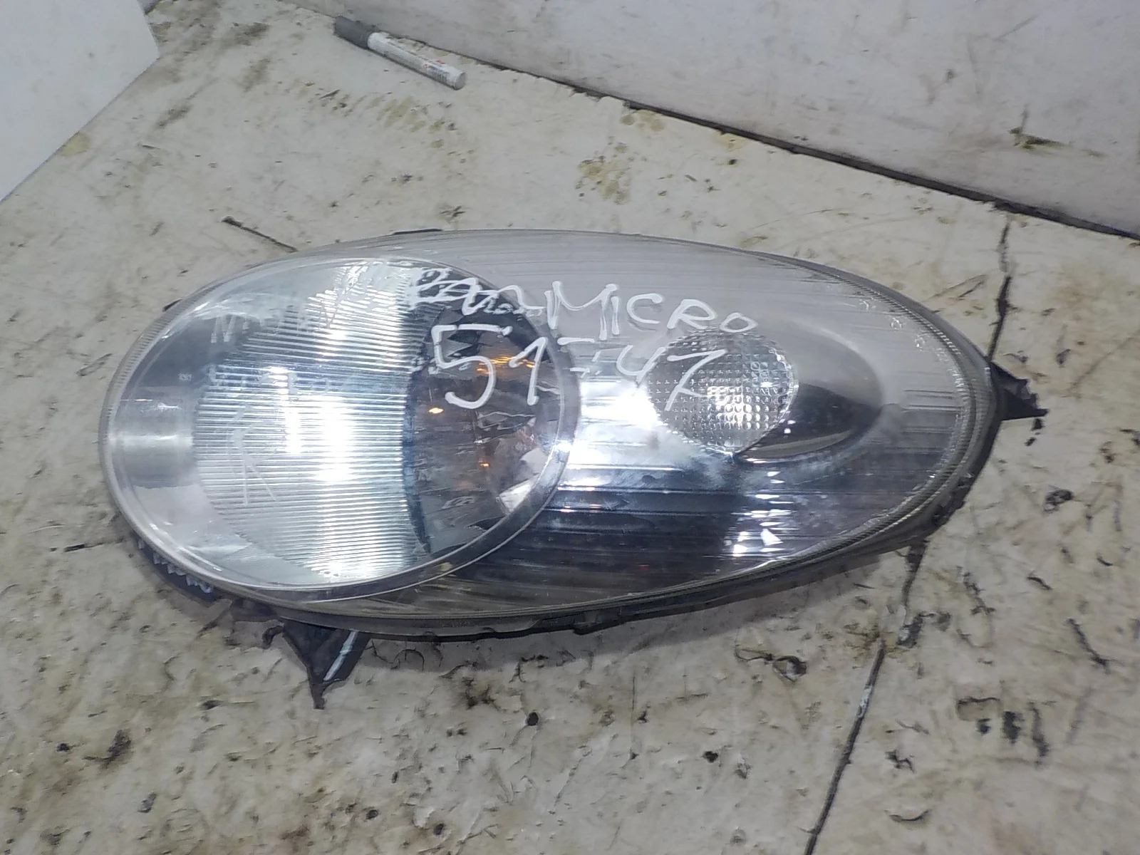 Фара Nissan Micra K12 (2002—2010) Перед Лево