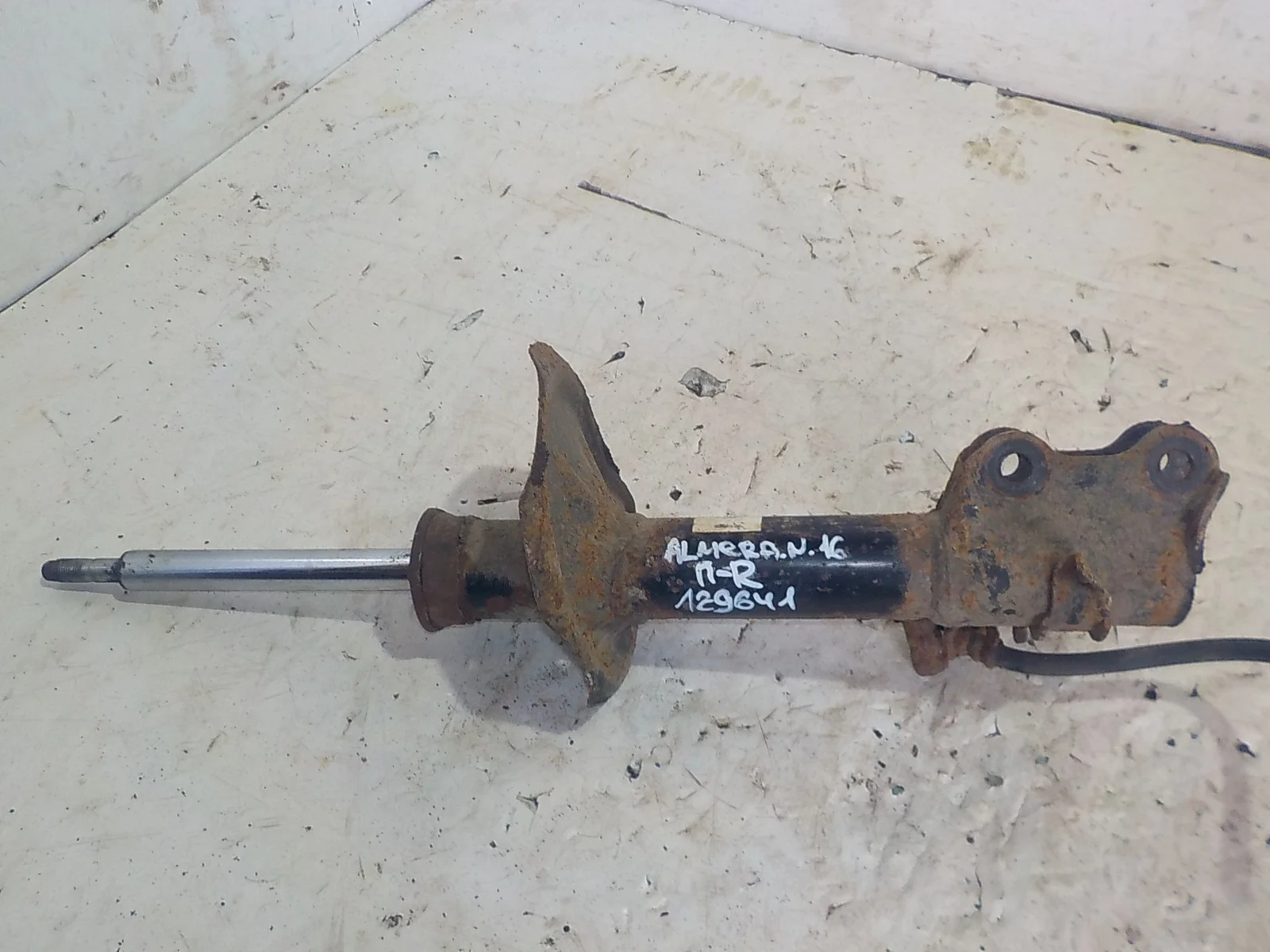 амортизатор Nissan Almera Classic I (2006—2013) Перед Право