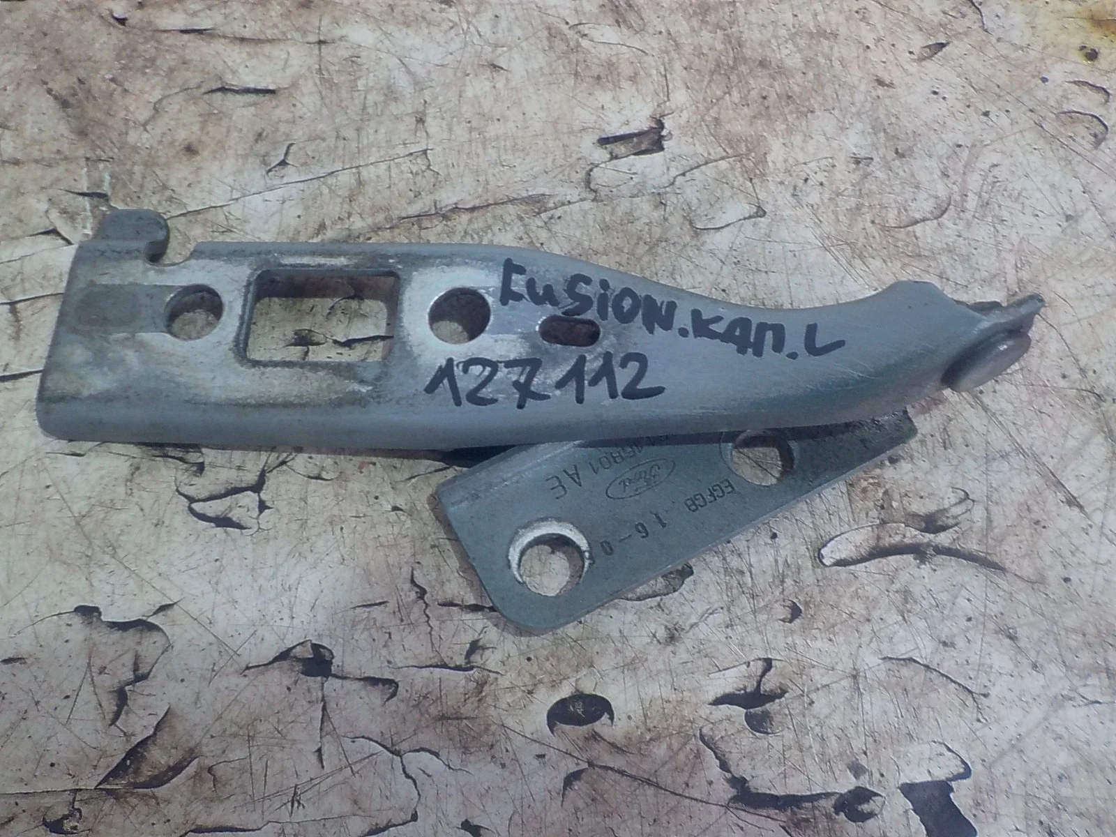 Петля капота Ford Fiesta Mk5 (2002—2008) Перед Лево