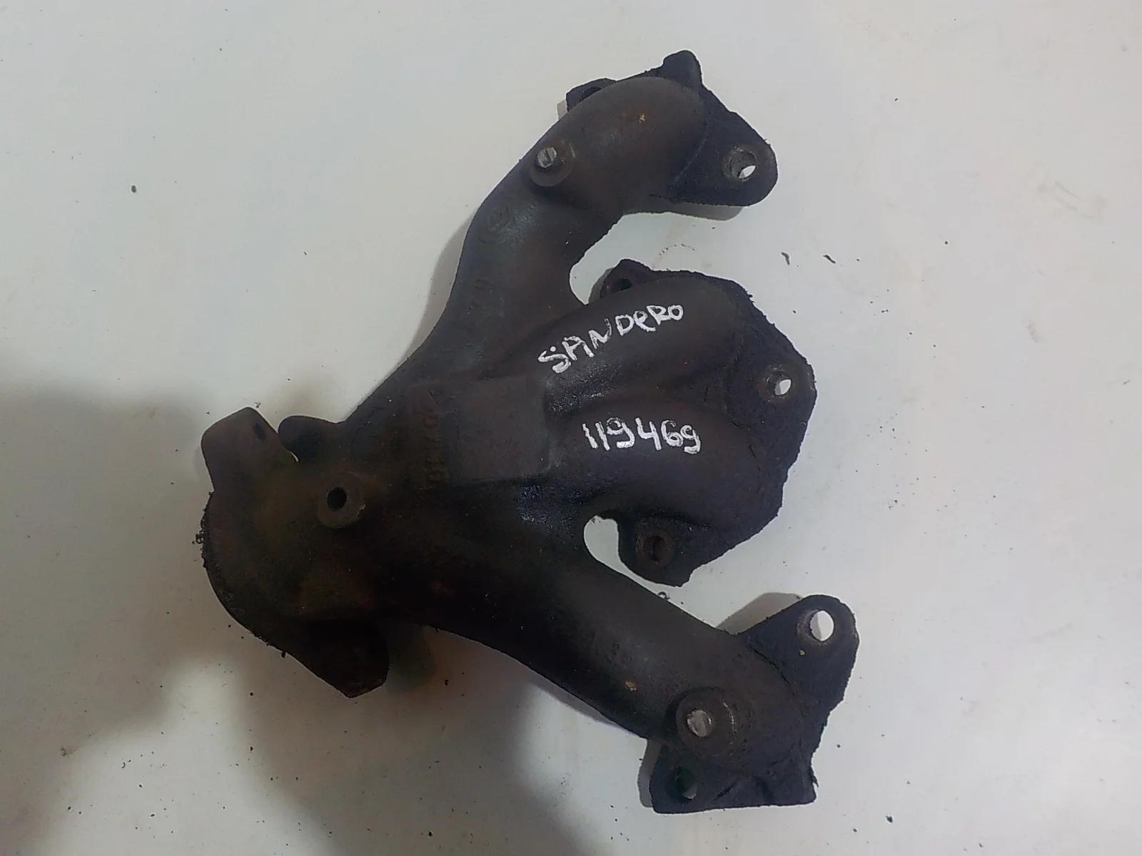 Коллектор выпускной Renault Logan I (2004—2009)