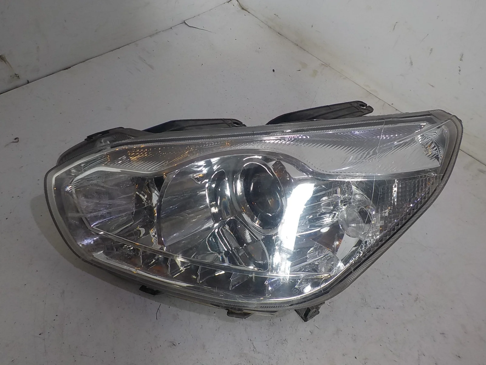 Фара Chery Tiggo (T11) T11 рестайлинг (2013—2016) Перед Лево