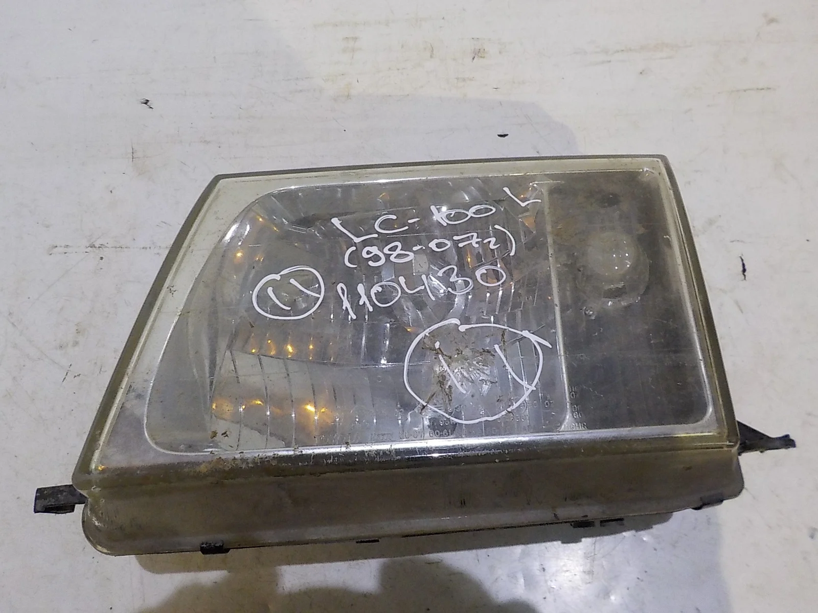 Фара Toyota Land Cruiser 100 (1998—2002) Перед Лево