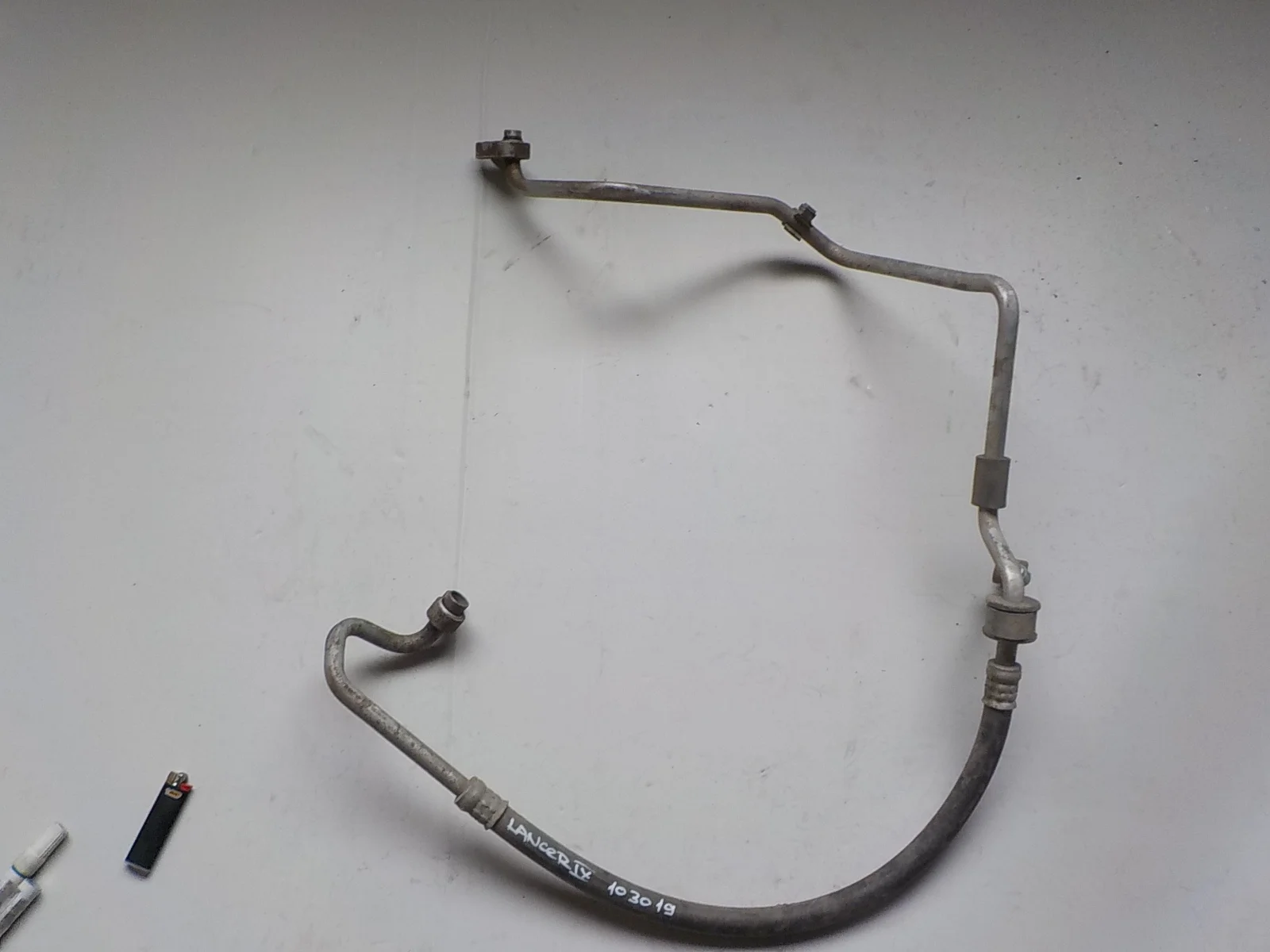 Трубка кондиционера Mitsubishi Lancer IX (2000—2007)