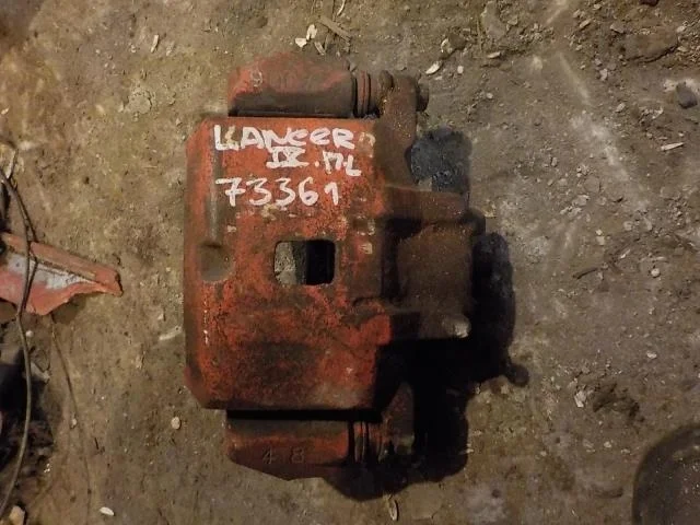 суппорт Mitsubishi Lancer IX (2000—2007) Перед Лево