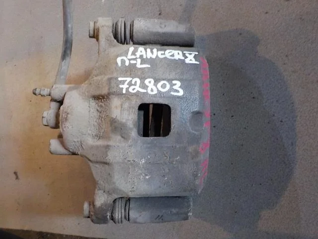 суппорт Mitsubishi Lancer X (2007—2010) Перед Лево