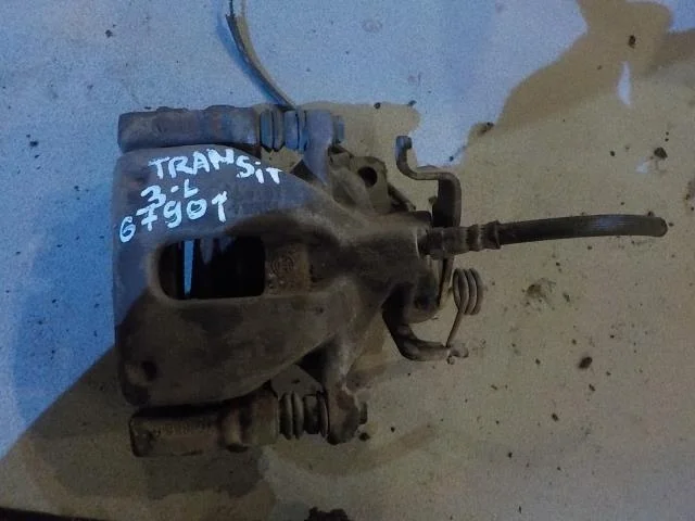 суппорт Ford Transit VII (2006—2014) Зад Лево