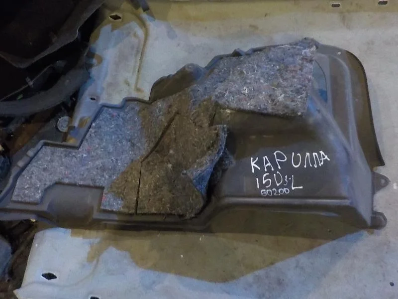 Обшивка багажника Toyota Corolla X (2006—2010)  Лево