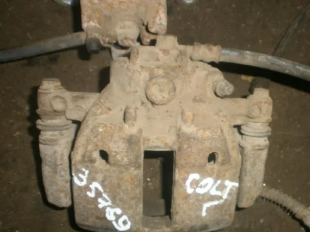 суппорт Mitsubishi Colt Z30 (2002—2012) Перед Лево