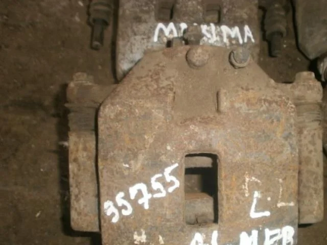 суппорт Nissan Primera P11 (1995—2000) Перед Лево