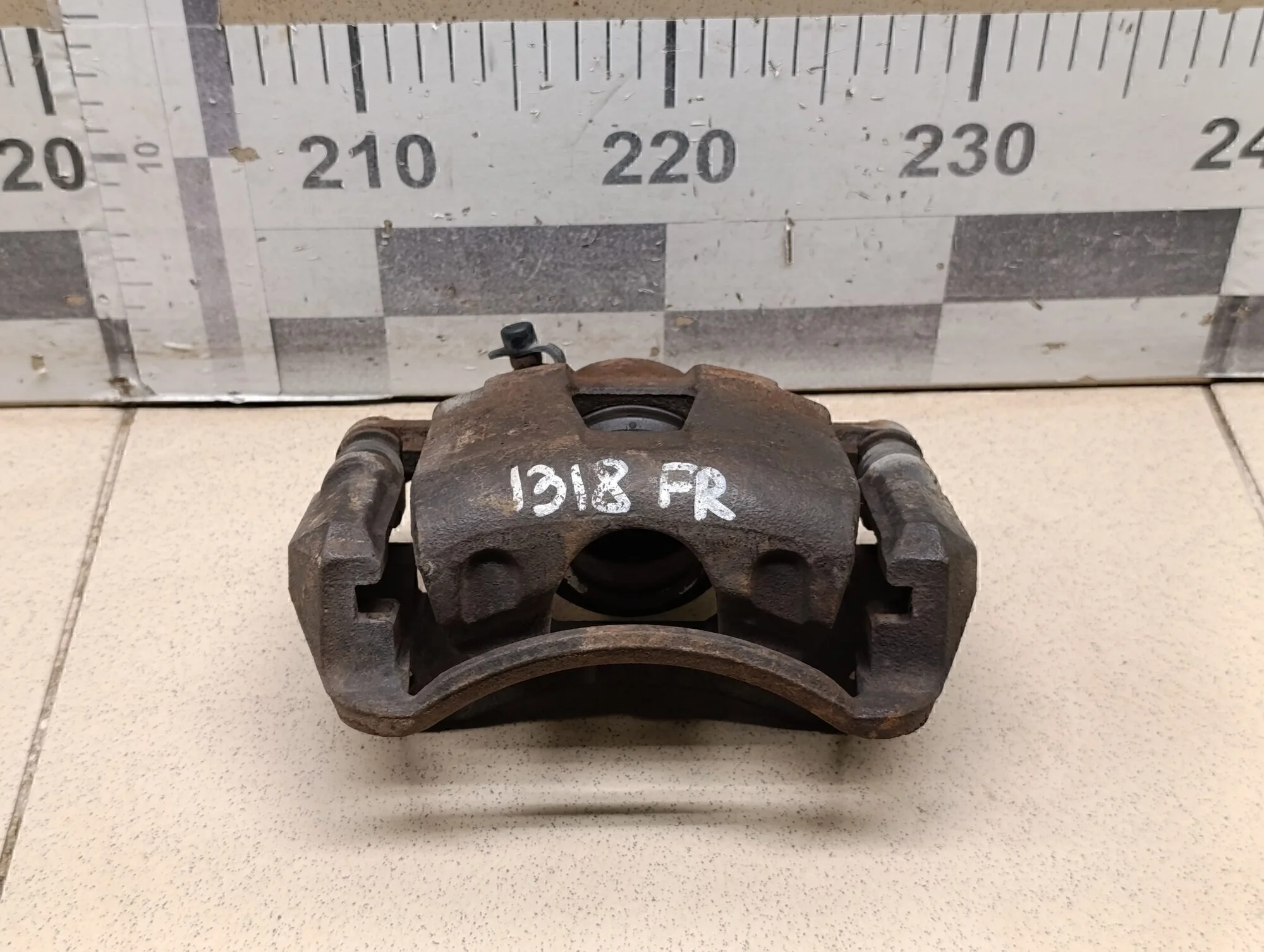 Суппорт передний правый Aveo (T200) 2003-2008