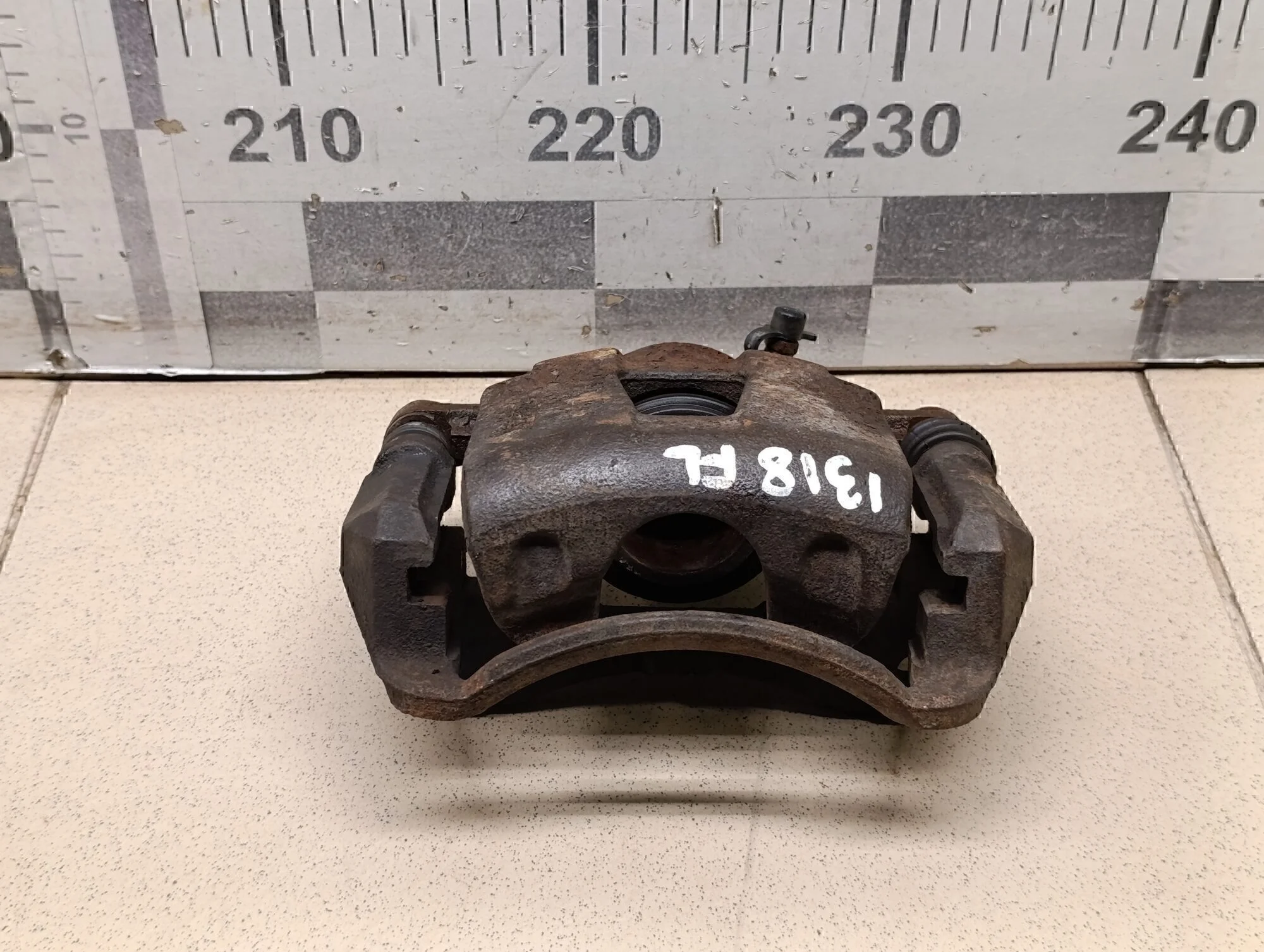 Суппорт передний левый Aveo (T200) 2003-2008