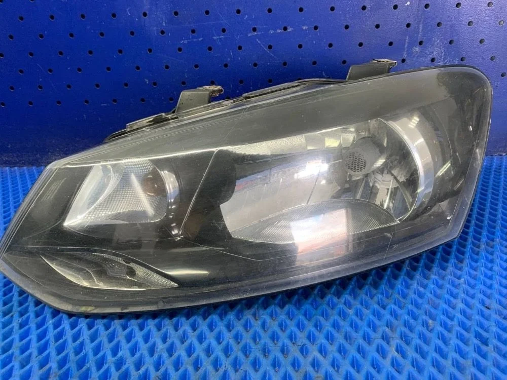 Фара левая Volkswagen Polo V (2009—2015) б.у