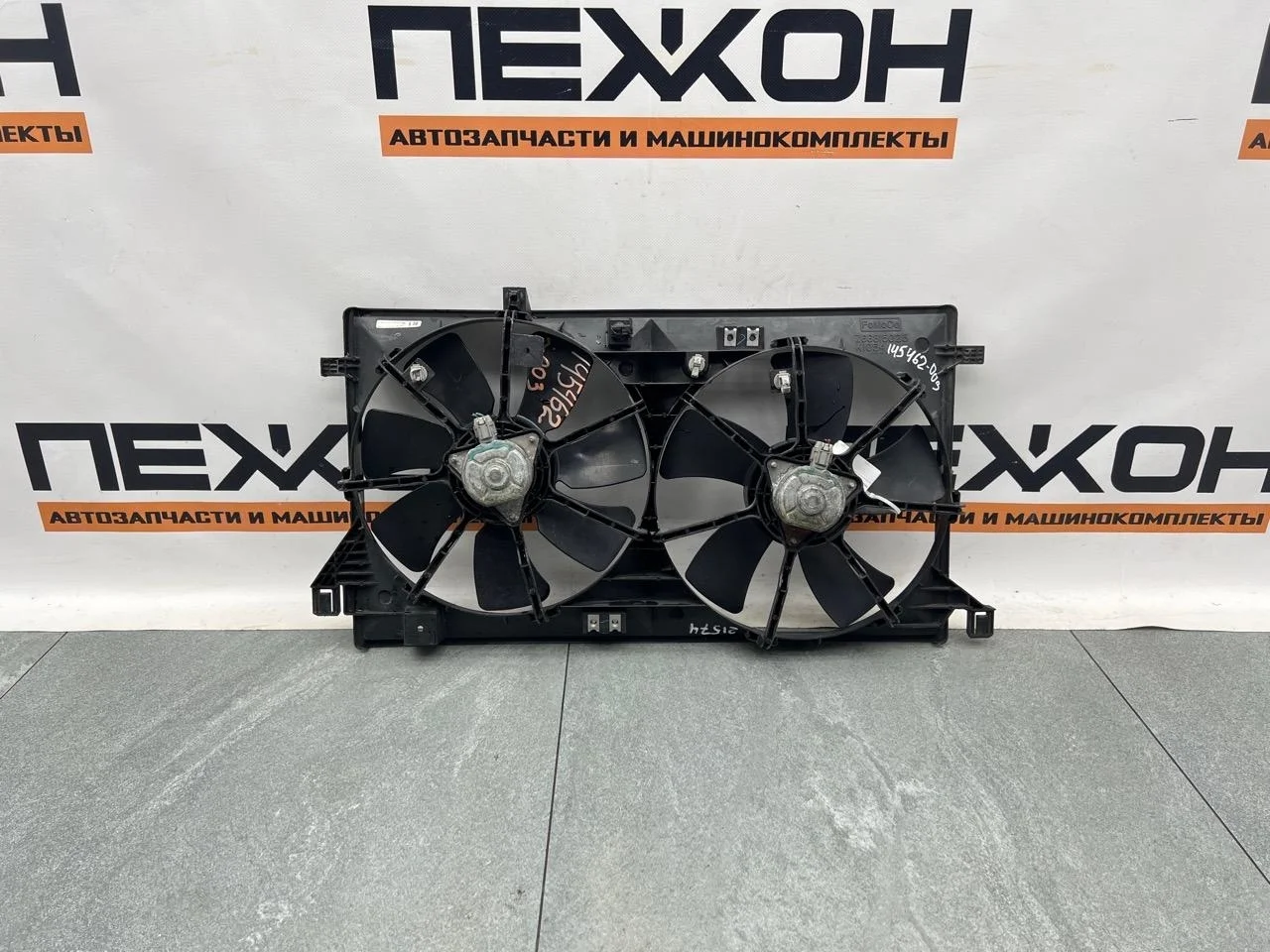 Диффузор с вентилятором MAZDA 3 Z66815025 BL