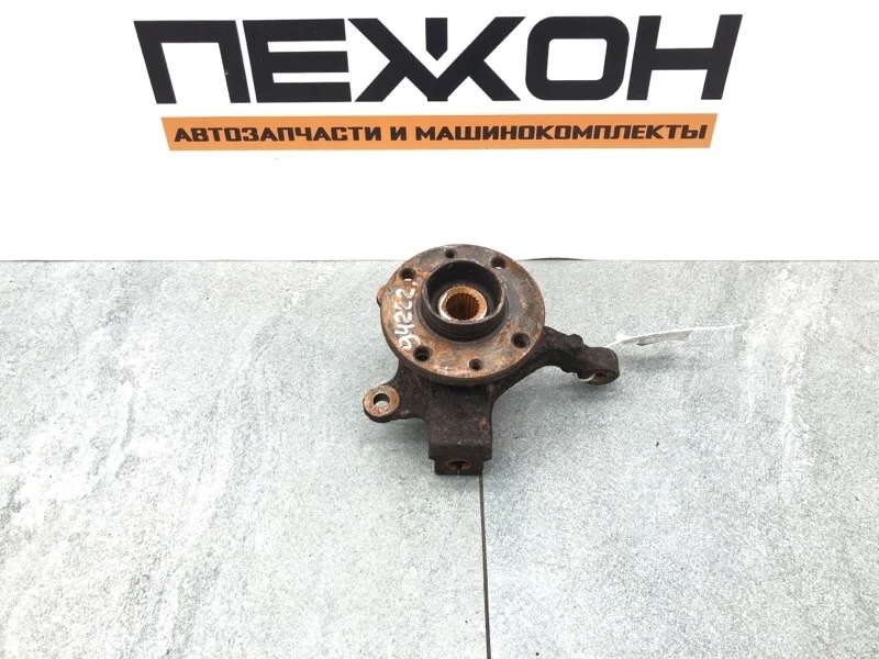 Кулак NISSAN NOTE 2008 40015AX600 E11 1.4 CR14, передний левый