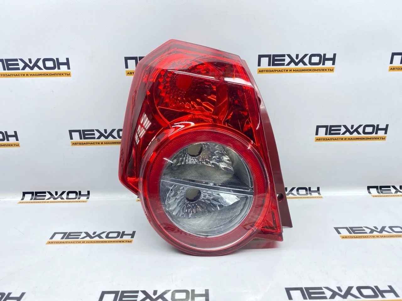 Фонарь (не оригинал) CHEVROLET AVEO 22151310 T255, левый