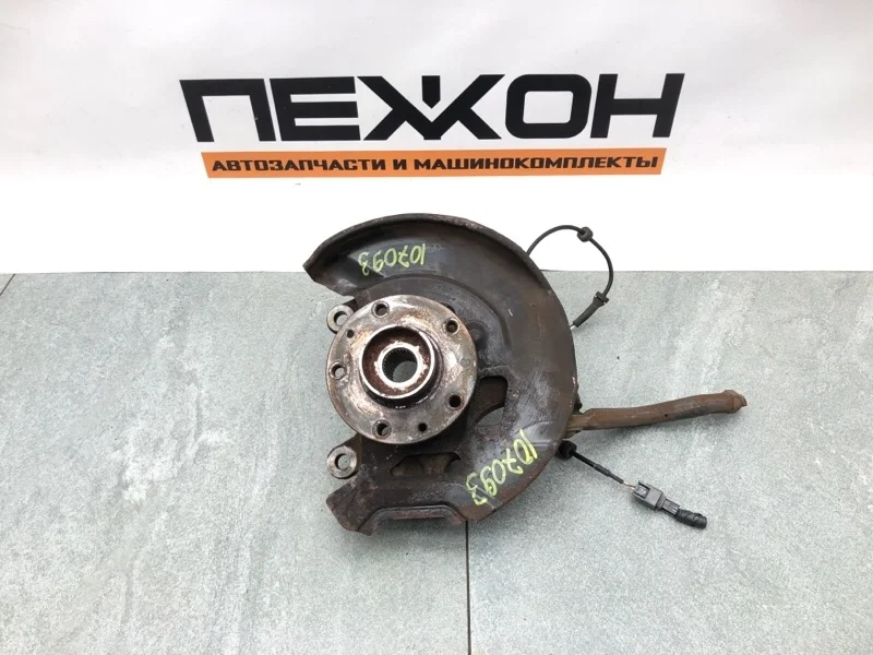 Кулак NISSAN QASHQAI 400154EA0A J11E, передний левый
