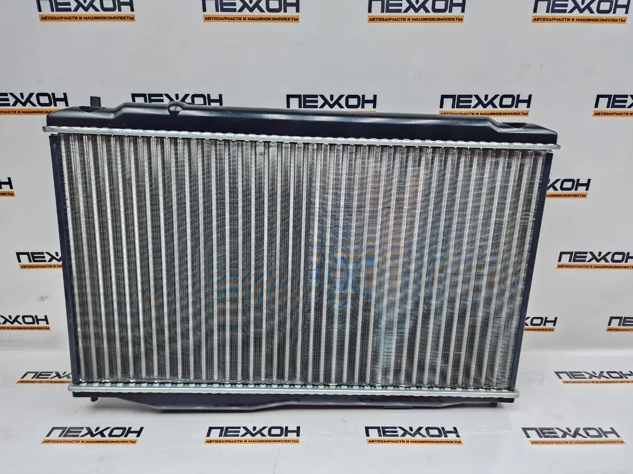 Радиатор охлаждения (не оригинал) HONDA CIVIC 218710JP 8