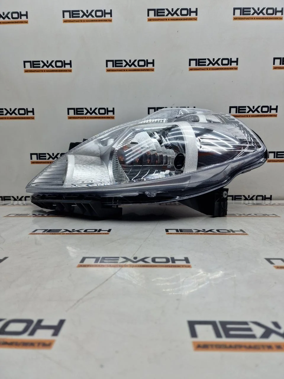 Фара (не оригинал) NISSAN TIIDA 21511C5LLDEM 1, левая