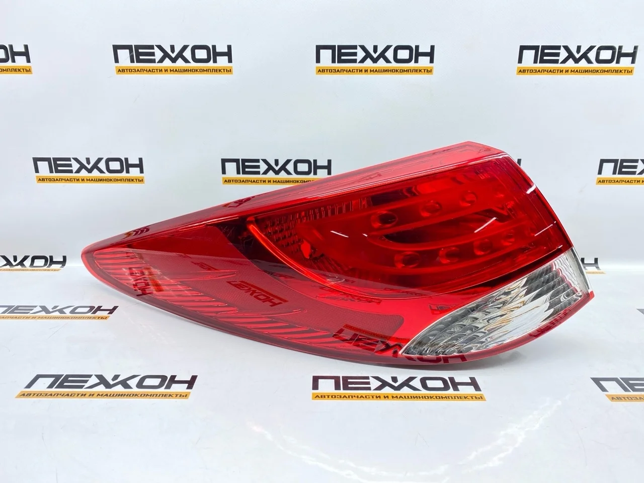 Фонарь (не оригинал) HYUNDAI ix35 2211954LUE 1, левый