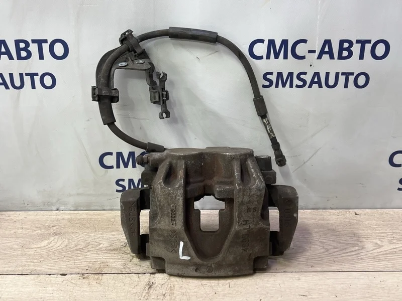 Суппорт Mercedes-Benz ML 2012 A1664211381 W166 642.826, передний левый