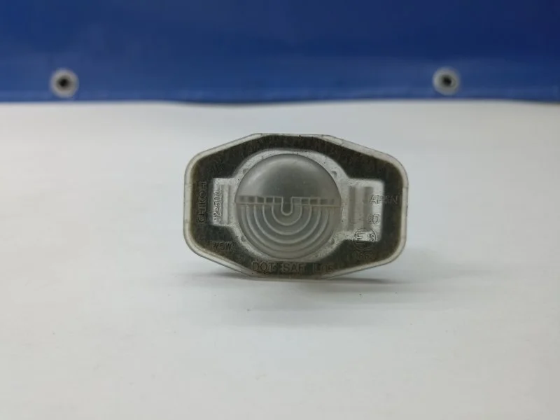Подсветка номера Toyota Corolla 2008 8127012520 E150