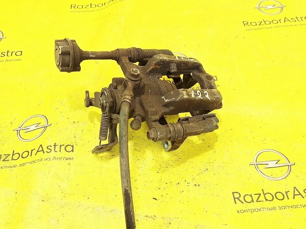 Суппорт тормозной Opel Astra GTC J (2009—2012)