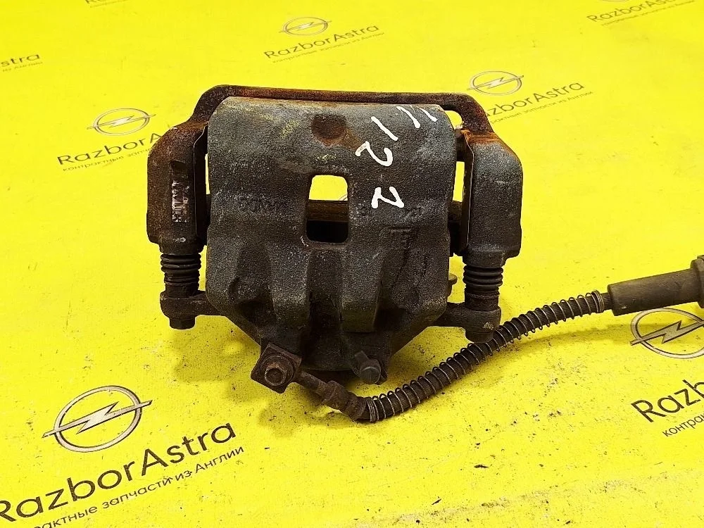 Суппорт тормозной передний правый Opel Astra GTC J (2009—2012)