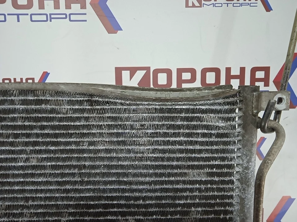 Радиатор кондиционера Б/У гнутый