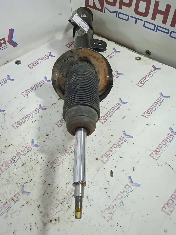 Амортизатор передний левый 546502P100 Б/У Б/У