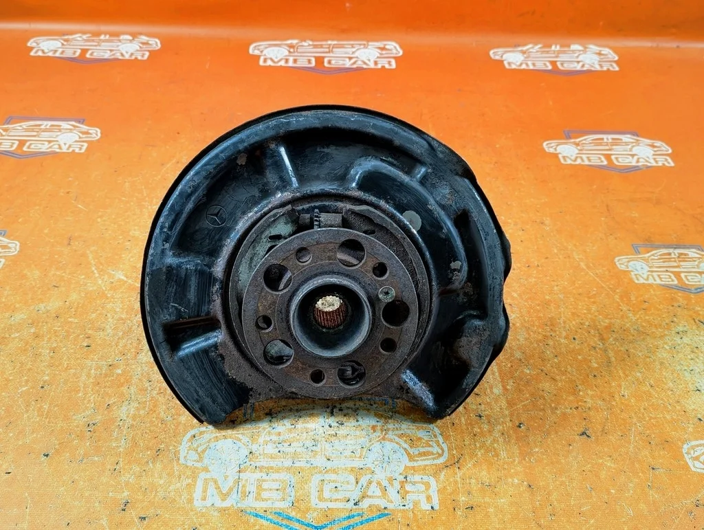 Кулак подвески задний левый Mercedes-Benz