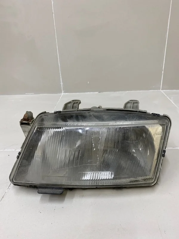 Фара левая Saab 900 NG 2.0