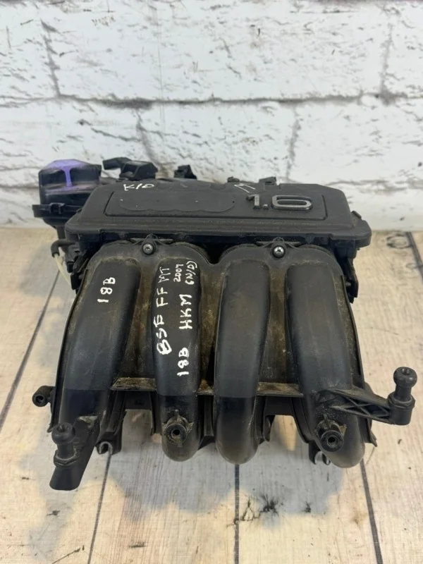 Коллектор впускной Skoda Octavia 2009 A5