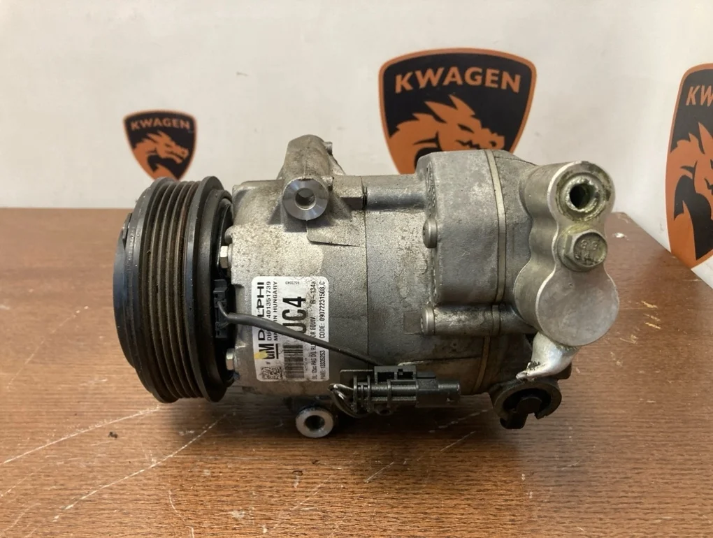 Компрессор кондиционера Opel Astra 2012 J