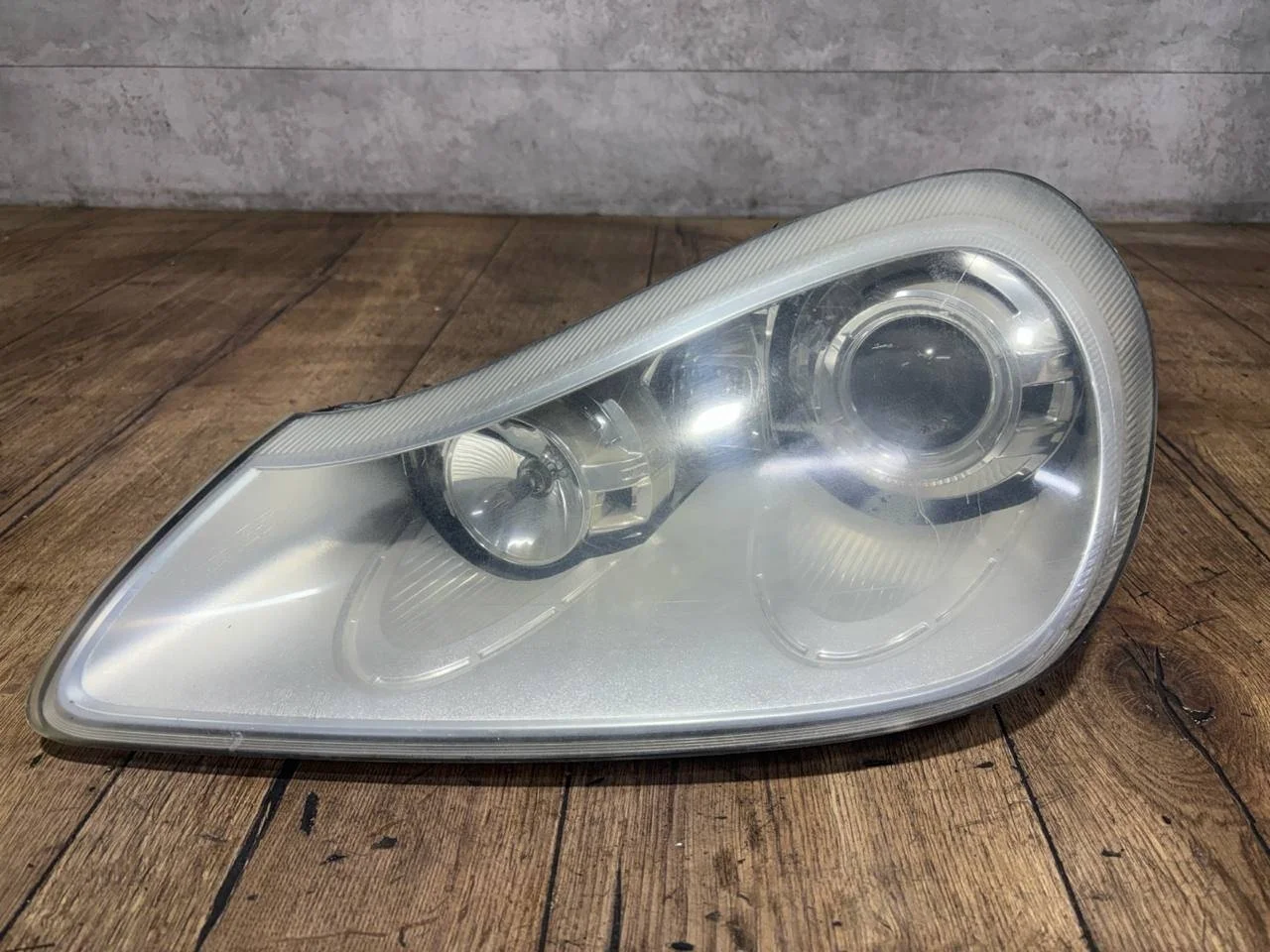 фара левая Porsche Cayenne 957