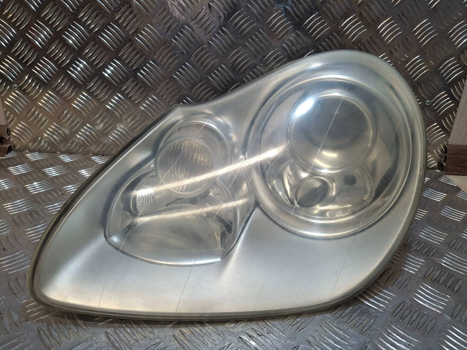 фара левая Porsche Cayenne 955