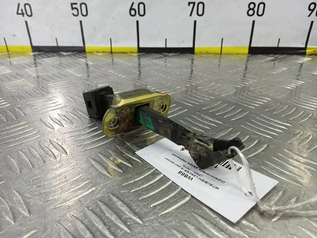 Ограничитель двери передней MITSUBISHI LANCER IX