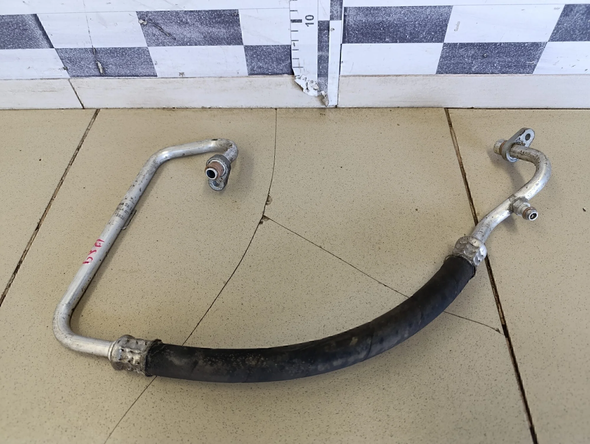 Трубка кондиционера Logan 2005-2014