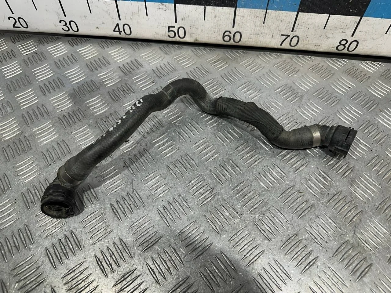 [Б/У] Шланг системы охлаждения (от бачка к доп помпе) [Код: 00588055 ]