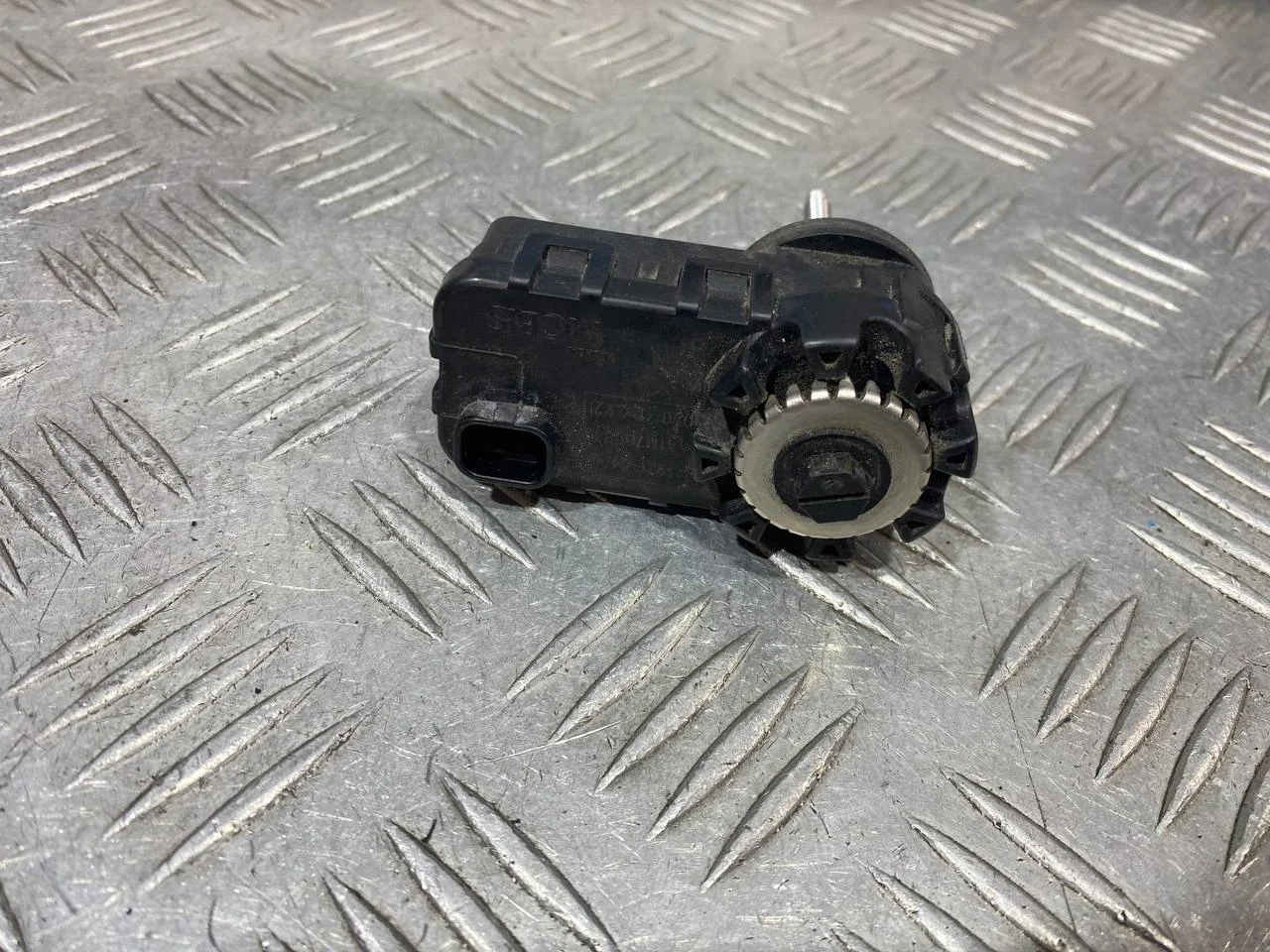 [Б/У] Моторчик корректора фары [Код: 00684439 ]