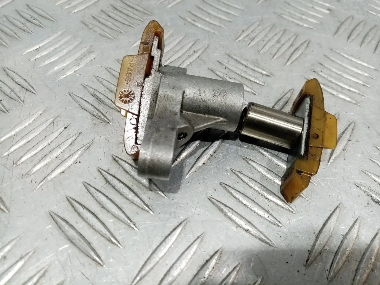 [ЧАСТЬ Б/У] Цепь с натяжителем Land Rover - (Состояние: только натяжитель) [Код: 00594161 ]