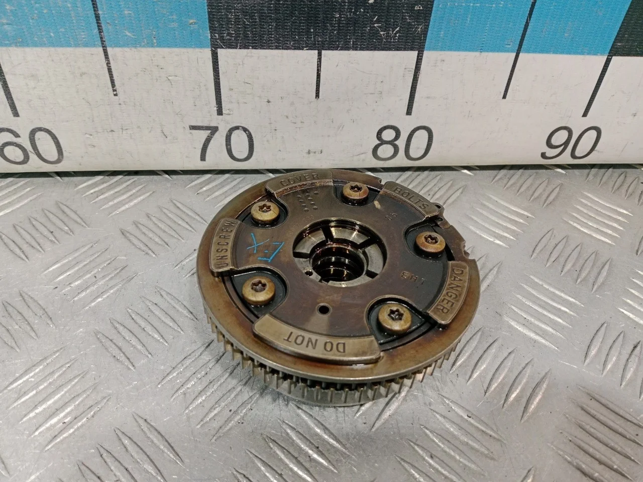 [Б/У] Механизм изменения фаз ГРМ левый (выпуск) [Код: 00589853 ]