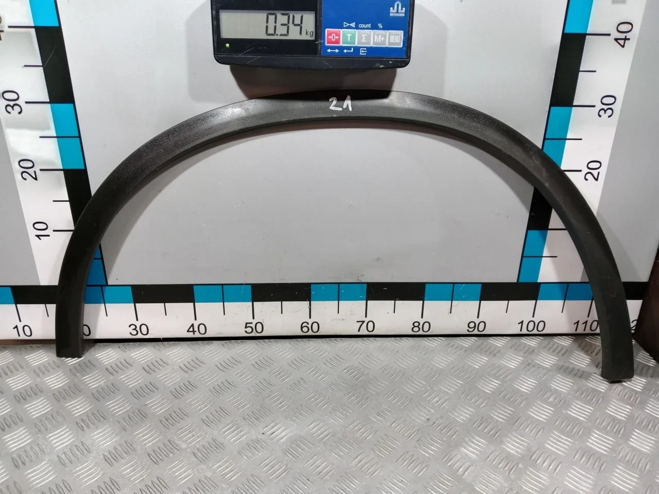 [Б/У] Накладка переднего левого крыла - (Состояние: потертости) [ХОРОШЕЕ] [Код: 00652634 ]