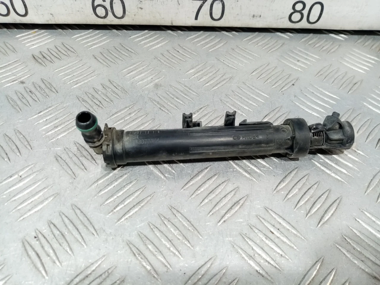 [Б/У] Форсунка омывателя фары левая [Код: 00610888 ]