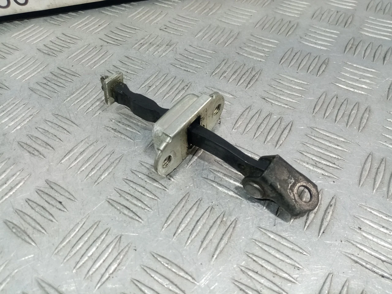 [Б/У] Ограничитель передней двери NISSAN [Код: 00594665 ]