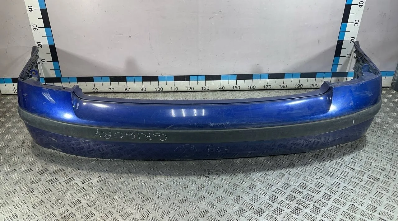 [Б/У] Бампер задний (седан) VW Passat (B5) 2000-2005 - нет куска пластика [ХОРОШЕЕ] [Код: 00609164 ]