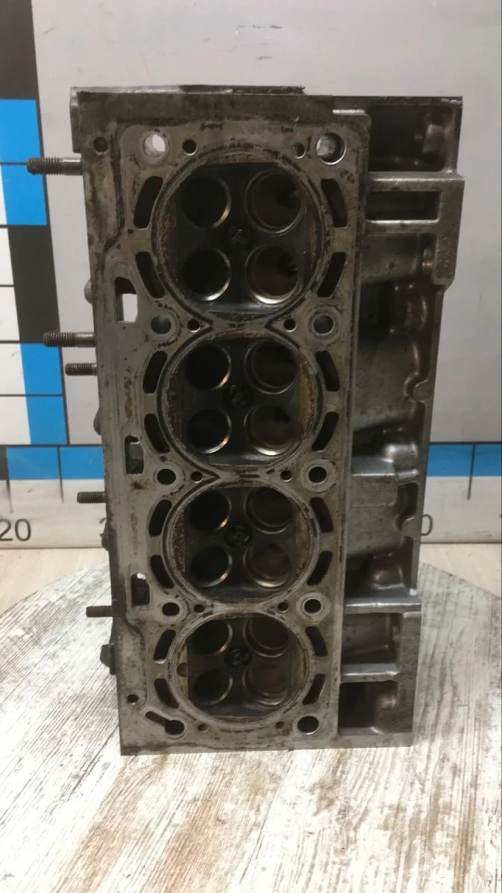 [Б/У] Головка блока цилиндров (1.4) VAG - без клапанов [Код: 00574532 ]