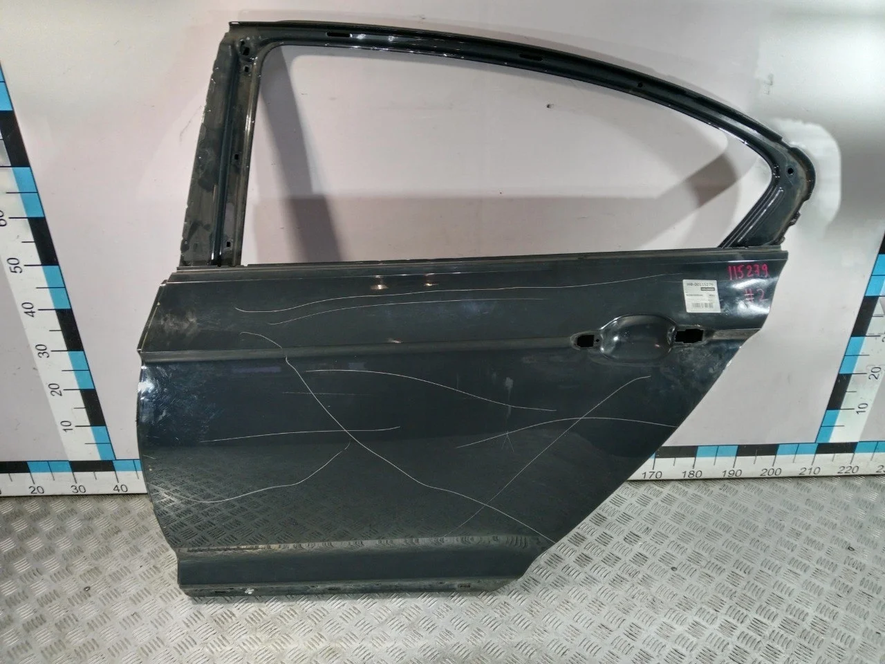 [Б/У] Дверь задняя левая VW Passat B8 - Шпаклевана с краю 670 мкм [ХОРОШЕЕ] [Код: 00528659 ]