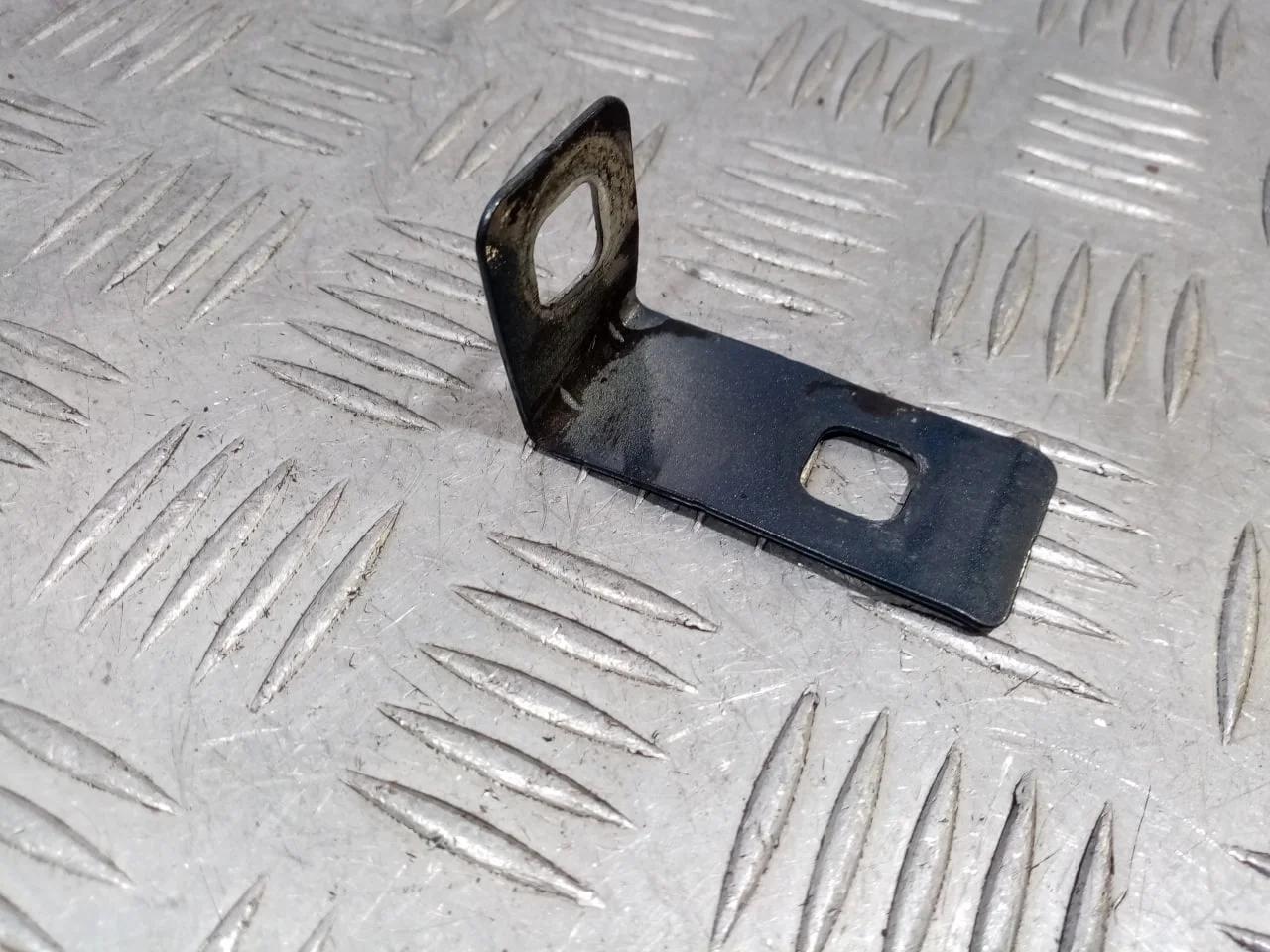 [Б/У] Кронштейн передней панели [Код: 00528855 ]