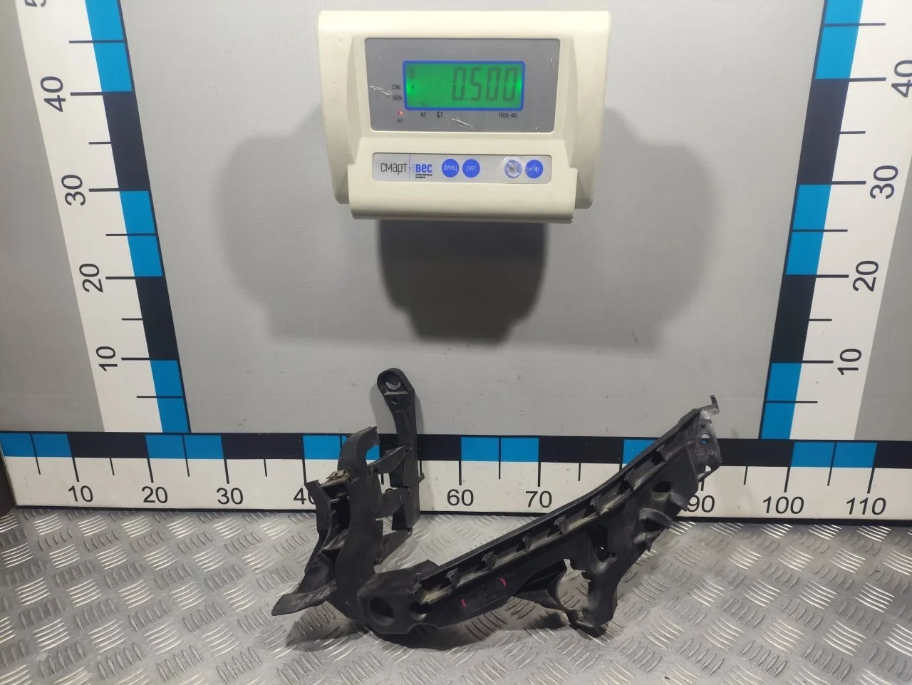 [Б/У] Кронштейн фары левый [Код: 00667652 ]