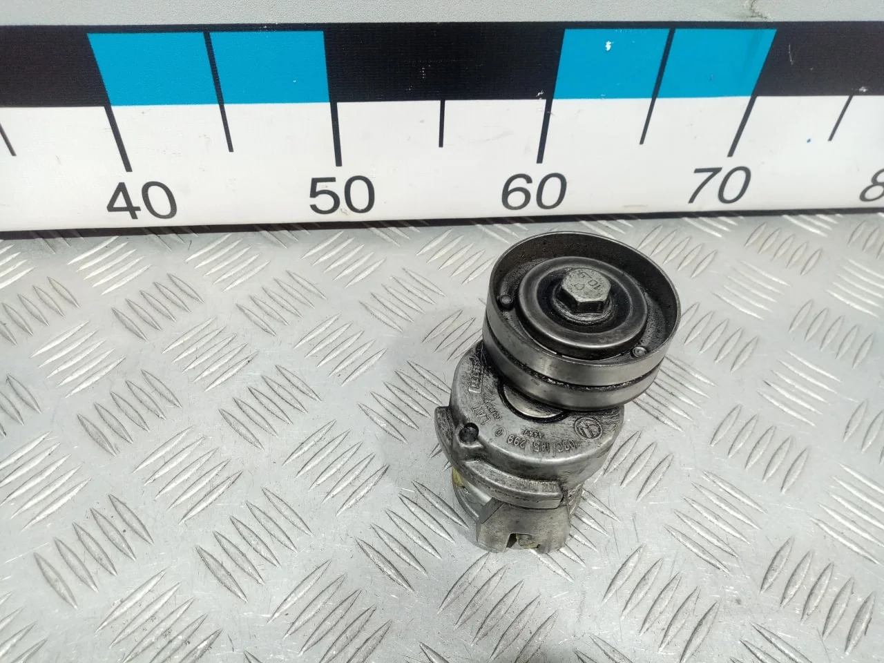 [Б/У] Натяжитель ремня [Код: 00622337 ]